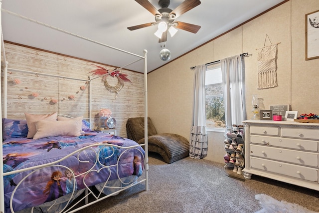 carpeted bedroom featuring crown molding, ceiling fan, and vaulted ceiling