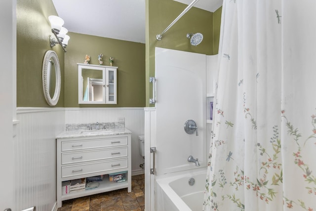 bathroom with vanity and shower / bath combo with shower curtain