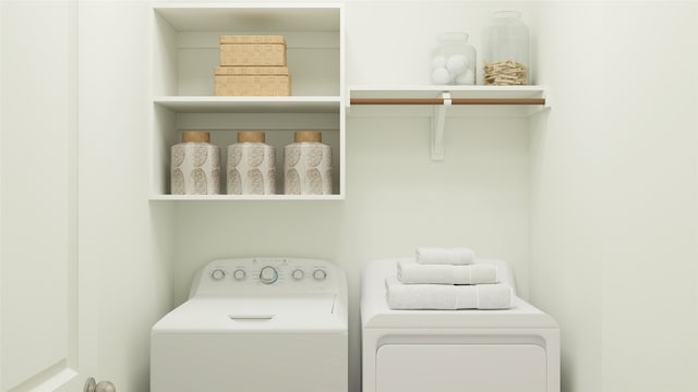 laundry room with washer and dryer