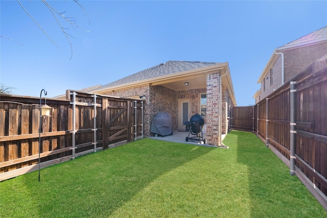 rear view of property featuring a lawn