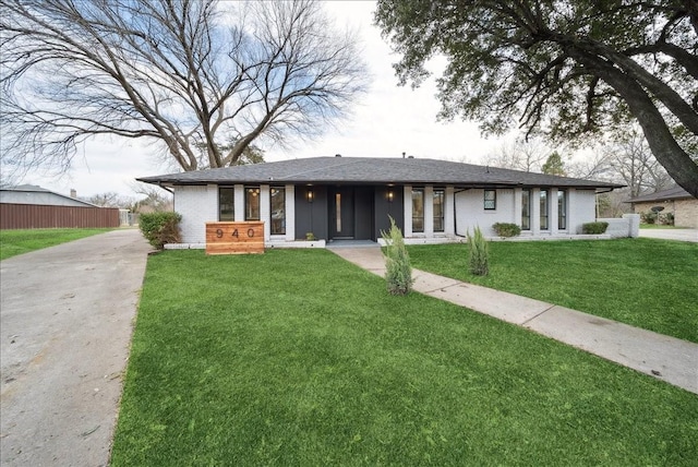 view of front of house with a front lawn