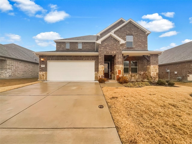 view of front of property with a garage