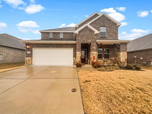 view of front of property featuring a garage