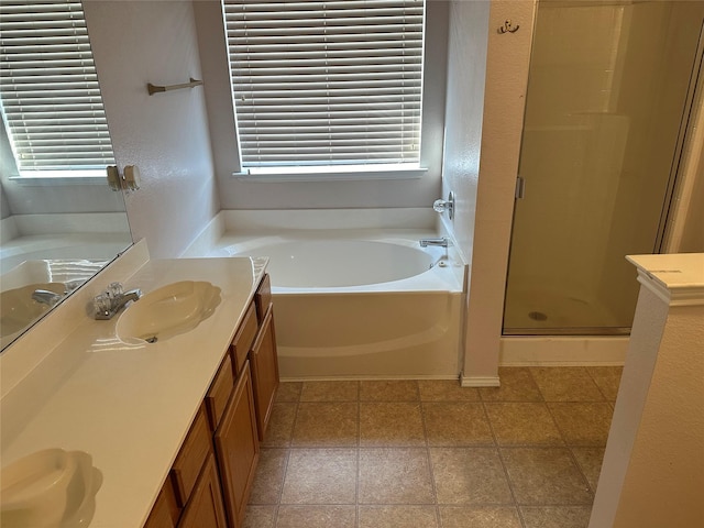 bathroom with vanity and plus walk in shower