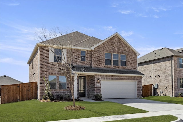 traditional-style house with brick siding, concrete driveway, a front yard, and fence