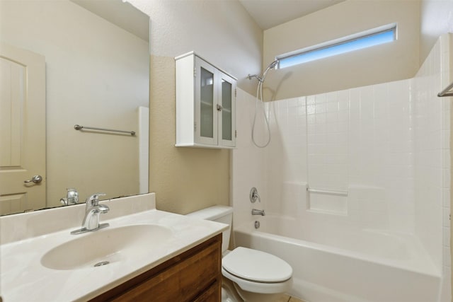 full bathroom featuring vanity, bathtub / shower combination, and toilet