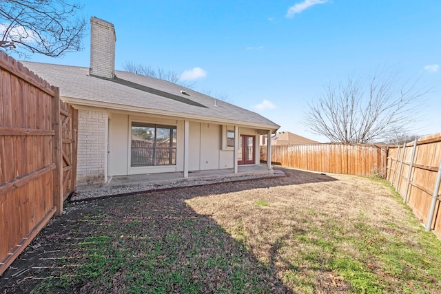 back of house featuring a patio