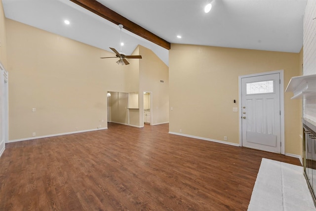 unfurnished living room featuring ceiling fan, dark wood-type flooring, high vaulted ceiling, and beamed ceiling