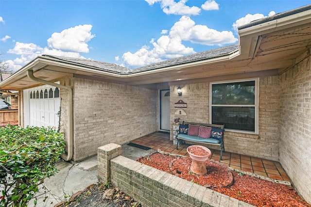 entrance to property featuring a patio area