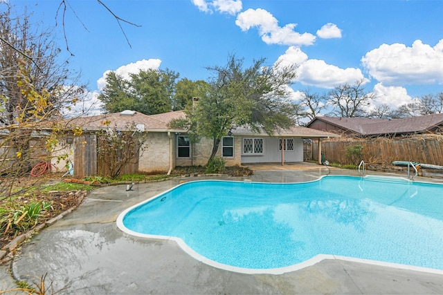 view of pool featuring a patio area