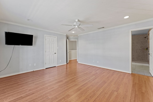 interior space with crown molding, ceiling fan, and light hardwood / wood-style floors