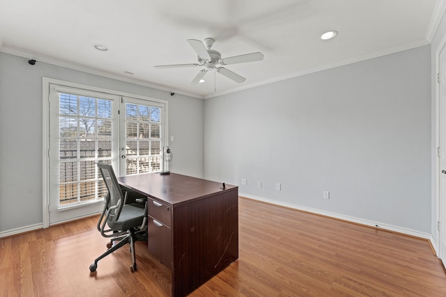 home office featuring crown molding, ceiling fan, and light hardwood / wood-style floors