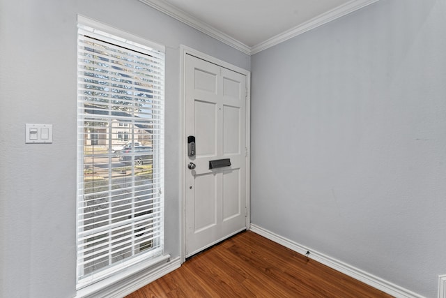 doorway to outside featuring crown molding and wood-type flooring