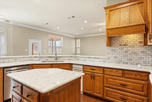 kitchen featuring sink, ornamental molding, dishwasher, custom range hood, and decorative backsplash