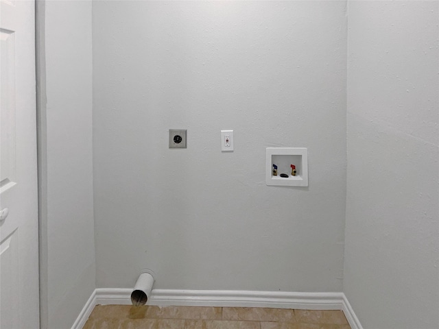 washroom with hookup for an electric dryer and hookup for a washing machine