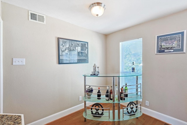 interior space with hardwood / wood-style flooring