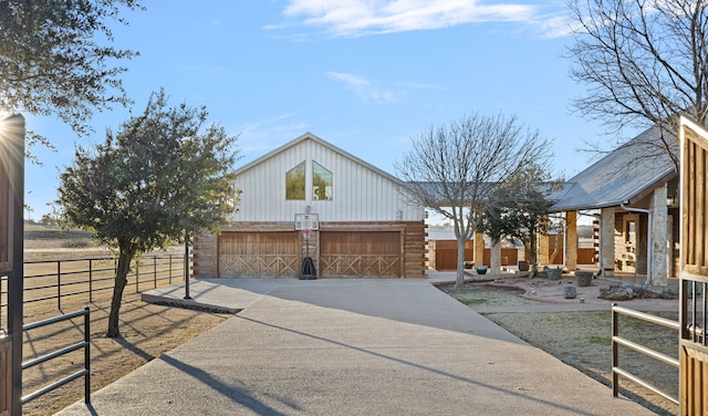 view of front of house featuring an outbuilding and a garage