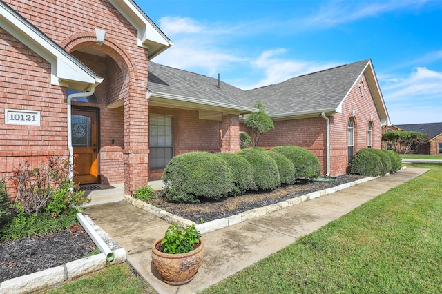 exterior space with a yard