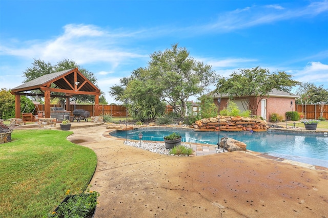 view of swimming pool with a gazebo, a yard, and a patio area