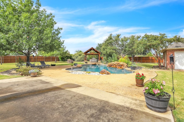 view of pool with a gazebo, a patio, and a lawn