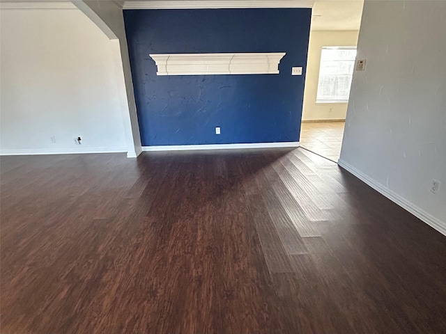 empty room featuring hardwood / wood-style flooring