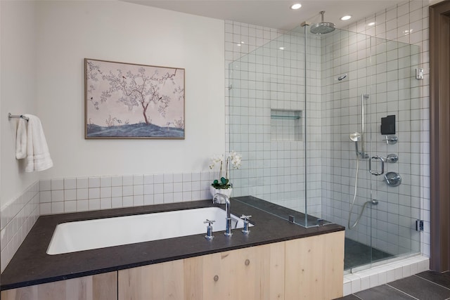 bathroom with independent shower and bath