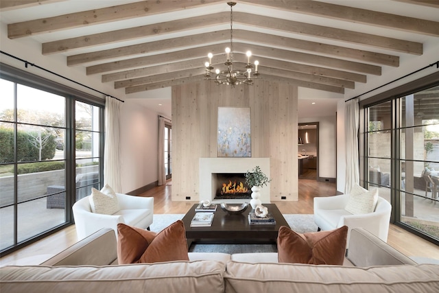 living room featuring an inviting chandelier, light hardwood / wood-style floors, lofted ceiling with beams, and wood walls