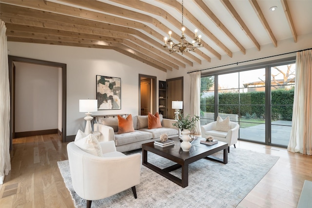 living room with a chandelier, lofted ceiling with beams, and light hardwood / wood-style flooring