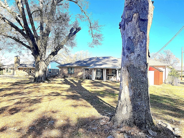 view of front of home with a front lawn