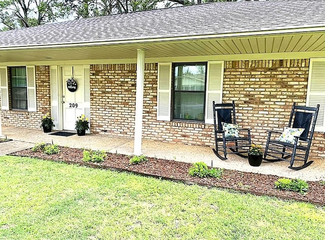 entrance to property with a porch