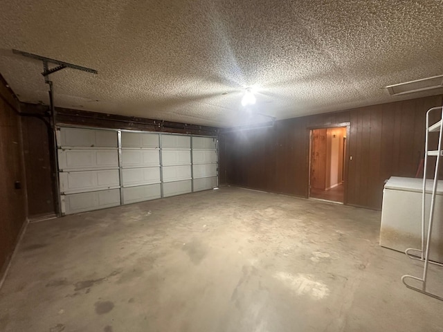 garage with wood walls