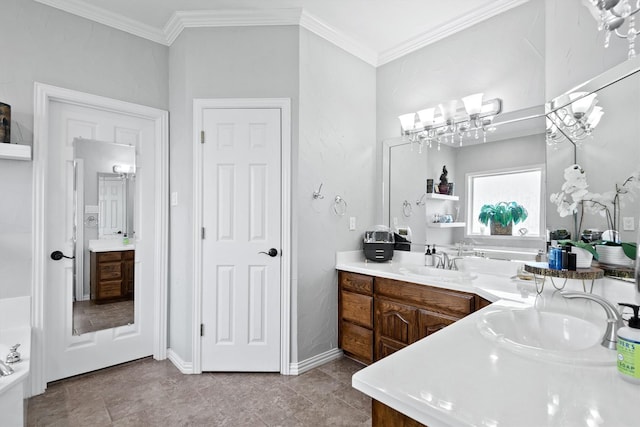 bathroom featuring crown molding and vanity