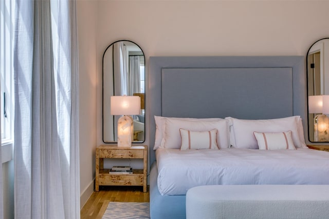 bedroom with light wood-type flooring