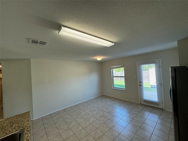 view of tiled empty room