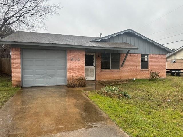 single story home with a garage and a front lawn