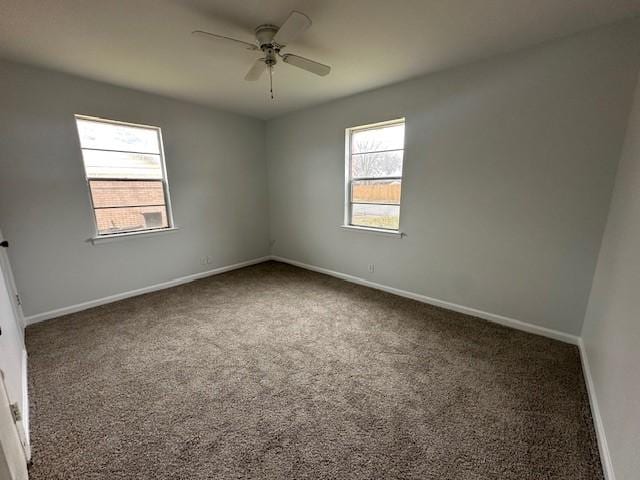 empty room with carpet floors and ceiling fan