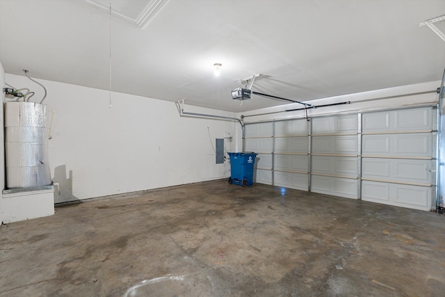 garage featuring a garage door opener and electric panel