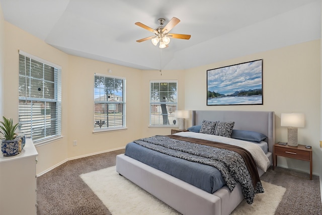 bedroom featuring ceiling fan and carpet