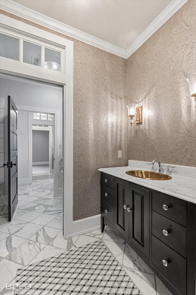 bathroom featuring ornamental molding and vanity