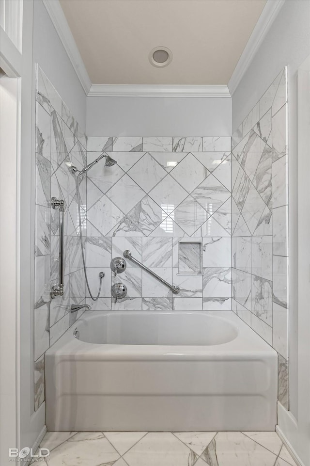 bathroom featuring tiled shower / bath and ornamental molding