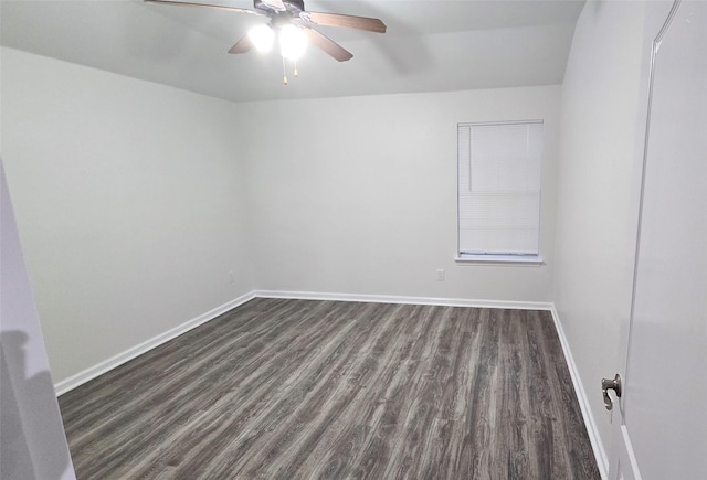 unfurnished room featuring ceiling fan and dark hardwood / wood-style floors