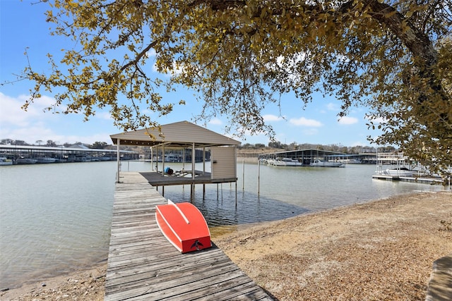 dock area featuring a water view