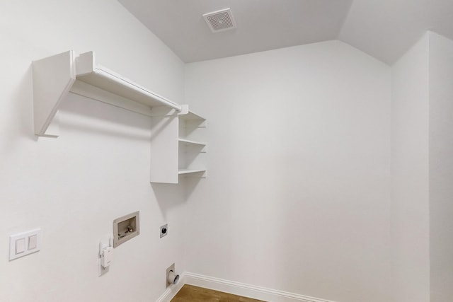 laundry area with dark wood-type flooring, hookup for an electric dryer, hookup for a gas dryer, and hookup for a washing machine