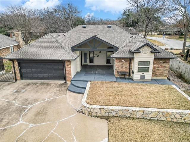 view of front of property featuring a garage