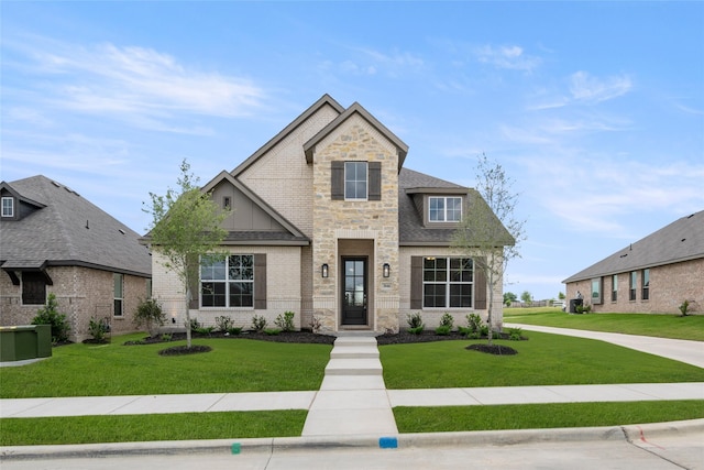 3046 Arbor Grv, Midlothian, TX 76065 - view of front facade featuring a front lawn, brick siding, and roof with shingles