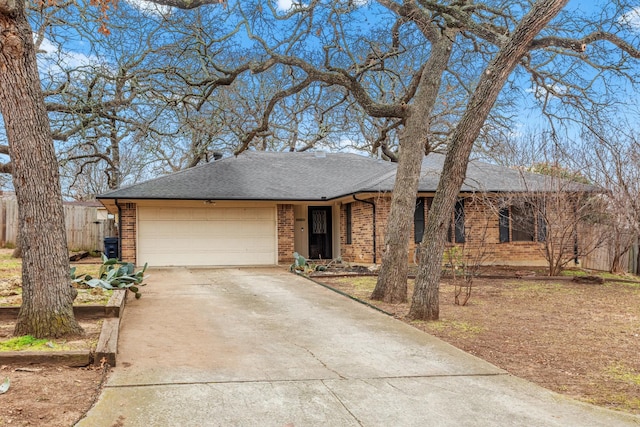 ranch-style home with a garage