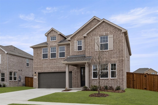 view of front facade featuring brick siding, concrete driveway, an attached garage, a front yard, and fence