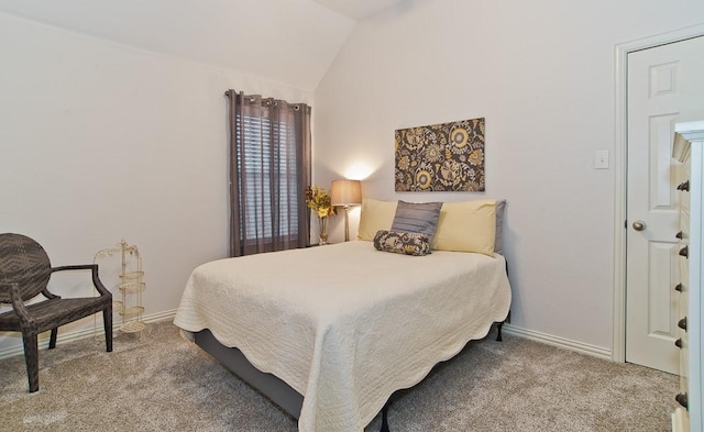 bedroom with light colored carpet and vaulted ceiling