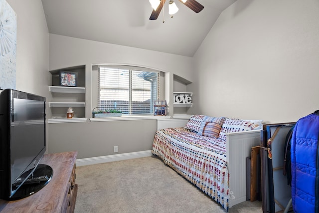 bedroom featuring lofted ceiling, light carpet, and ceiling fan