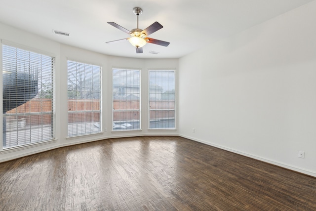 unfurnished room with wood-type flooring and ceiling fan